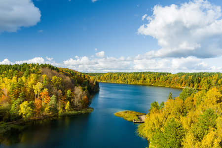 Aerial view of beautiful Balsys lake, one of six Green Lakes, located in Verkiai Regional Park. Birds eye view of scenic emerald lake surrounded by pine forests. Vilnius city, Lithuania.の写真素材