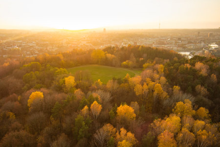 Beautiful Vilnius city panorama in autumn with orange and yellow foliage. Aerial evening view. Fall city scenery in Vilnius, Lithuaniaの写真素材
