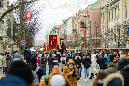 VILNIUS, LITHUANIA - MARCH 4, 2023: Cheerful people participating in humorous parade during Kaziuko...