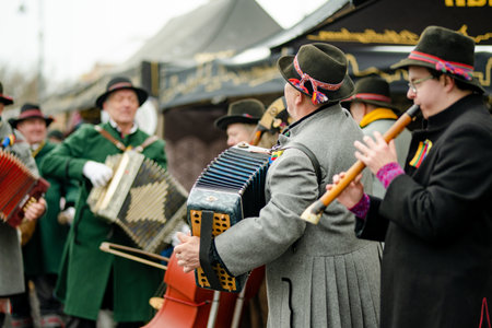 VILNIUS, LITHUANIA - MARCH 4, 2023: Musicians performing on Kaziuko muge or Kaziukas, traditional Easter market, annual crafts fair held every March on Old Town streets.のeditorial素材