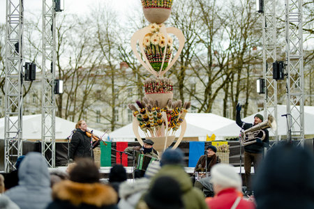 VILNIUS, LITHUANIA - MARCH 4, 2023: Hundreds of people attending Kaziuko muge or Kaziukas, traditional Easter market, annual crafts fair held every March on Old Town streets.のeditorial素材