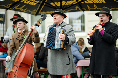 VILNIUS, LITHUANIA - MARCH 4, 2023: Musicians performing on Kaziuko muge or Kaziukas, traditional Easter market, annual crafts fair held every March on Old Town streets.のeditorial素材