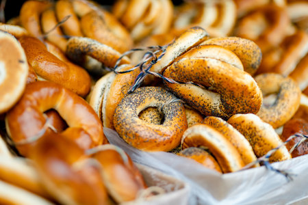 Loaves of organic bagels for sale at outdoor farmers market in Vilnius. Traditional spring fair in Vilnius, the capital of Lithuania.の写真素材
