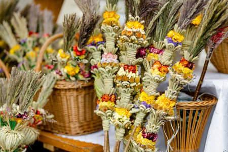 Traditional Lithuanian Easter palms known as verbos sold on Kaziukas, Easter market in Vilnius. Lithuanian capital's annual traditional crafts fair is held every March on Old Town streets.の写真素材