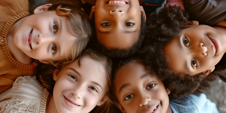 Portrait of cheerful multiracial kids looking into camera and smiling. Children of different skin color, top down view. Generative AI.の素材