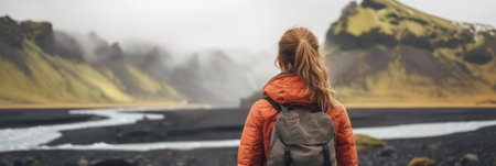 Young female hiker with a backpack admiring scenic view of spectacular Icelandic nature on a sunset. Breathtaking landscape of Iceland. Hiking by foot. Generative AI.の素材