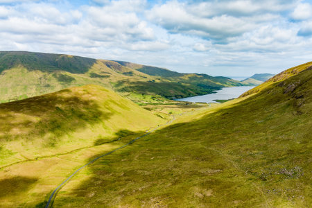Beautiful aerial sunset view of Connemara region in Ireland. Scenic Irish countryside landscape with magnificent mountains on the horizon, County Galway, Ireland.の写真素材