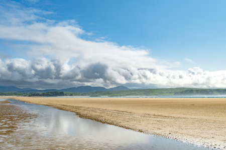 Five Finger Strand, one of the most famous beaches in Inishowen known for its pristine sand and surrounding rocky coastline with some of the highest sand dunes in Europe, county Donegal, Ireland.の写真素材