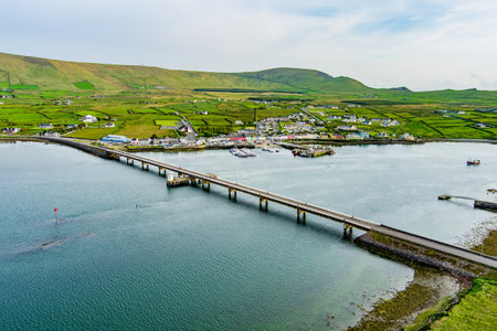 Aerial view of Maurice O'Neill Memorial Bridge, a bridge connecting Portmagee town and Valentia Island, county Kerry, Ireland.の写真素材
