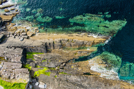 Aerial view of rough and rocky shore along famous Ring of Kerry route. Rugged coast of on Iveragh Peninsula, County Kerry, Ireland.の写真素材