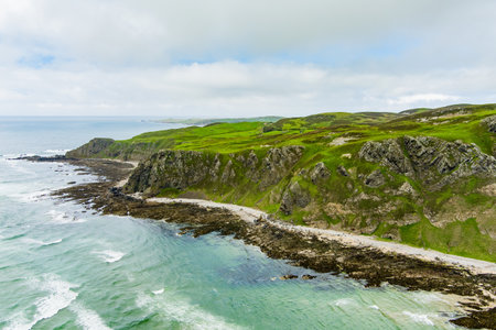 Five Finger Strand, one of the most famous beaches in Inishowen known for its pristine sand and surrounding rocky coastline with some of the highest sand dunes in Europe, county Donegal, Ireland.の写真素材