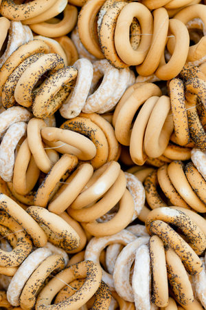 Loaves of organic bagels for sale at outdoor farmers market in Vilnius. Traditional spring fair in...