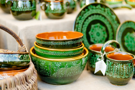 Ceramic dishes, tableware and jugs sold on Kaziuko muge or Kaziukas spring fair, traditional Easter market in Vilnius, Lithuaniaの写真素材