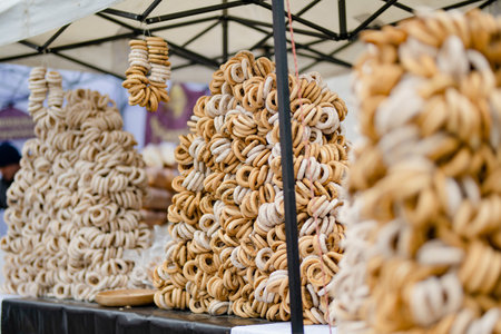 Loaves of organic bagels for sale at outdoor farmers market in Vilnius. Traditional spring fair in Vilnius, the capital of Lithuania.の写真素材