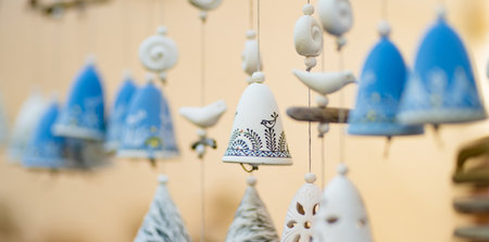 Colorful bells and other decorations sold on Easter market in Vilnius. Lithuanian capital's annual traditional crafts fair is held every March on Old Town streets.の写真素材