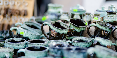 Ceramic dishes, tableware and jugs sold on Kaziuko muge or Kaziukas spring fair, traditional Easter market in Vilnius, Lithuaniaの写真素材