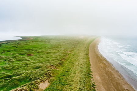 Inch beach, wonderful 5km long stretch of glorious sand and dunes, popular for surfing, swimming and fishing, located on the Dingle Peninsula, County Kerry, Irelandの写真素材
