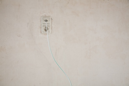 Interior wall with domestic power and tv outletの写真素材