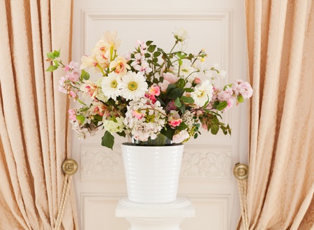 Flowers in white flowerpotの写真素材