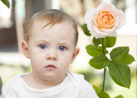 Cute little baby girl with big blue eyesの写真素材