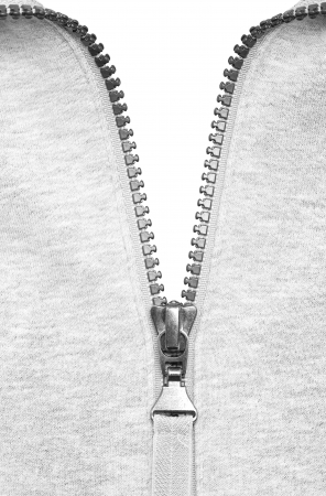 Zipper half closed, isolated on whiteの写真素材