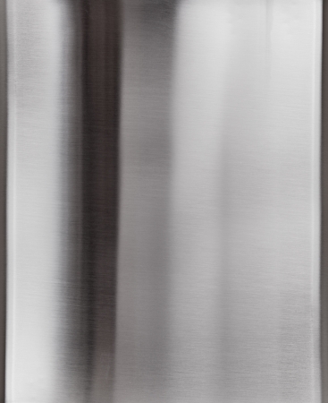 Shiny brushed metal plate surface の写真素材
