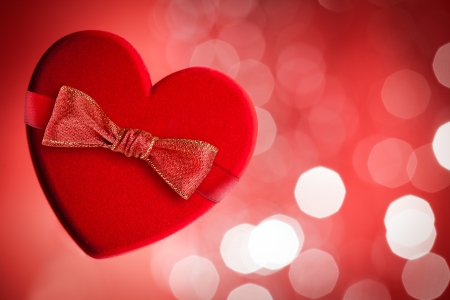 Red heart with red bowの写真素材
