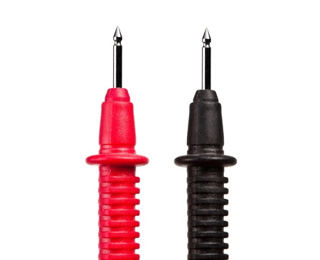 Red and black probes of multimeter isolated on white の写真素材