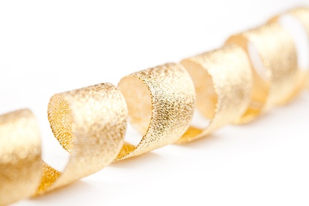 Golden ribbon, on white backgroundの写真素材