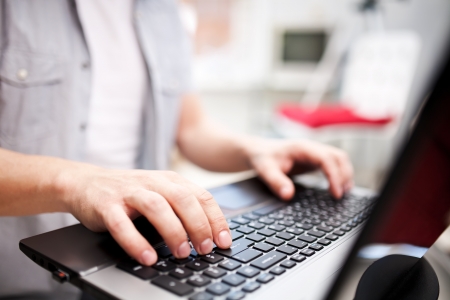 Man working on the laptop at home の写真素材