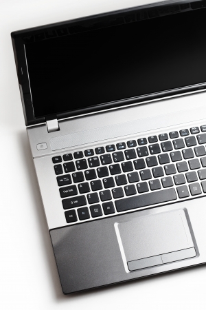 Gray laptop on white backgroundの写真素材