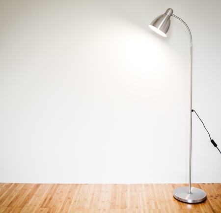 Empty room with modern floor lamp の写真素材