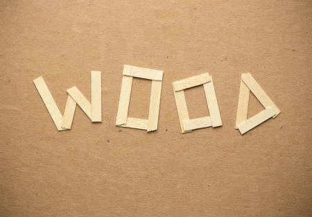 Word wood on paper の写真素材