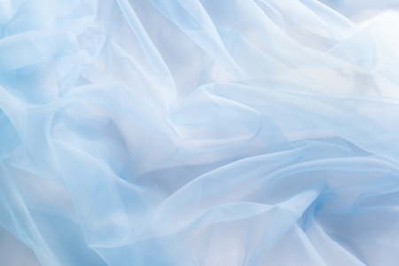 Smooth elegant blue fabric can use as backgroundの写真素材