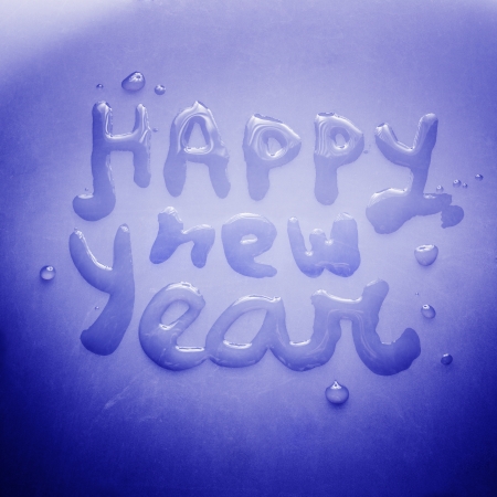Happy new year concept, water on ice, greeting cardの写真素材