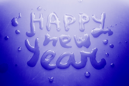 Happy new year concept, water on ice, greeting cardの写真素材