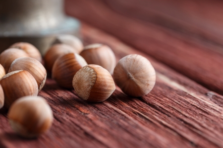 Hazelnuts, filbert on old wooden backgroundの写真素材