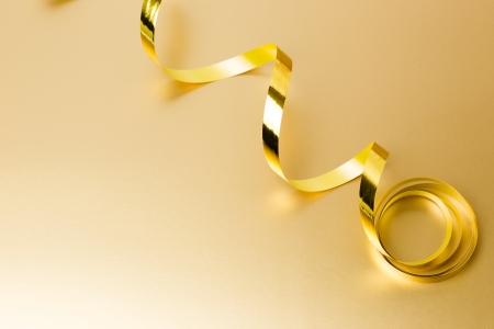 Golden ribbon on golden の写真素材