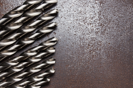  Twist drill bits on old metal textureの写真素材
