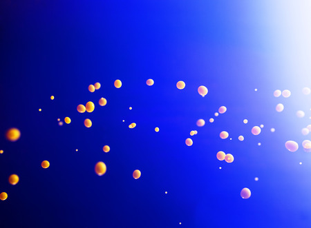Yellow drops on blue background