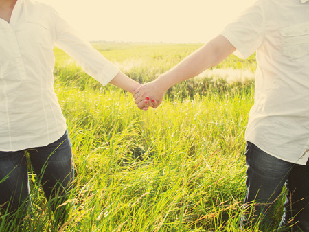 Happy couple outdoor, summertime, tinted photoの写真素材