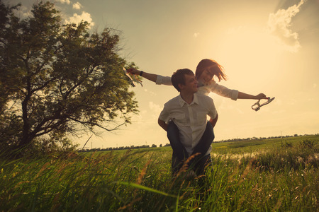 Happy couple outdoor, summertime, tinted photoの写真素材