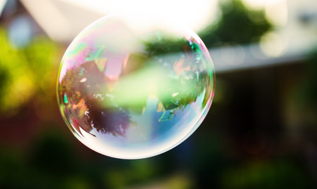 Big soap bubble flying, close up photo