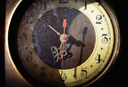 Vintage grunge clock face with vintage roman numerals