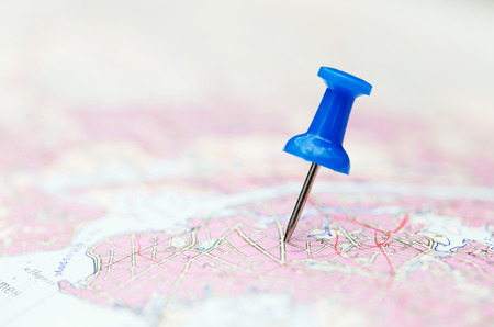 Travel destination, blue  pin on the mapの写真素材