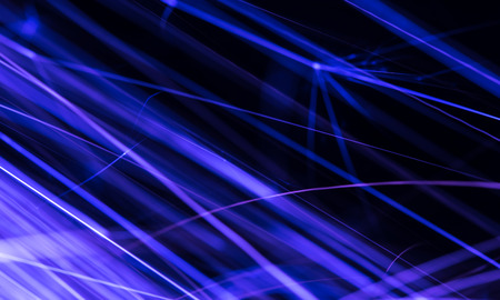 Flowing Sparks, photo with a slow shutter speed, blue tinted abstract background