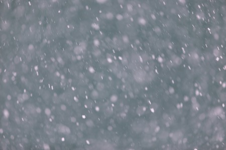 Winter background with falling snow.
