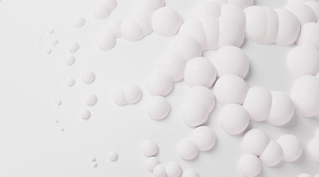 White balls on the white background.3D render. Minimalistic backdrop for any creative project.の写真素材
