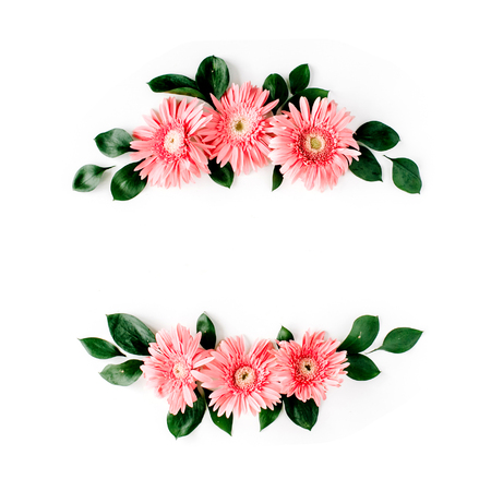 Pink gerbera daisy on white background. Flat lay. Frame wreathの写真素材