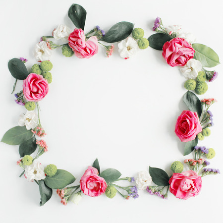 round frame wreath pattern with roses, pink flower buds, branches and leaves isolated on white background. flat lay, top viewの写真素材
